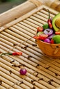 Fresh culinary ingredients for sauce guacamole on bamboo. Royalty Free Stock Photo