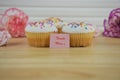 Fresh cupcakes with flowers and a mothers day note of thanks Royalty Free Stock Photo