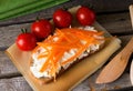 Fresh curd cheese on bread with carrot Royalty Free Stock Photo