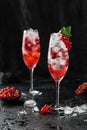 Fresh currant cocktail. Fresh summer cocktail with red currant and ice cubes. Glass of red currant mojito Royalty Free Stock Photo