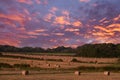 Fresh cut bales of hay at Perceton Mains at Sunset Ayrshire Scotland