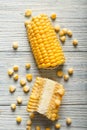 Fresh cut corn cob on wooden table Royalty Free Stock Photo