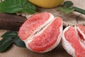 Colorful of grapefruit on wooden background.