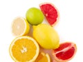 Fresh cut grapefruite lemon and orange on a white background