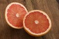 Fresh cut pink grapefruit halves Royalty Free Stock Photo