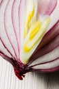 Fresh cut red onion closeup slices of vegetables on white background