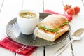 Fresh cut sandwich bowl of vegetable soup Royalty Free Stock Photo