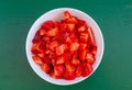 Fresh cut strawberries in a white bowl Royalty Free Stock Photo