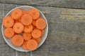 Fresh cut thick carrots on white bowl Royalty Free Stock Photo