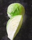 Fresh cut and whole green cabbage vegetable Royalty Free Stock Photo