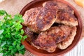 Fresh cutlets on plate on a table