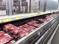 Fresh cuts of beef meat in the refridgerated meat aisle of a Sams Club grocery store ready to be purchased by consumers