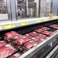 Fresh cuts of beef meat in the refridgerated meat aisle of a Sams Club grocery store ready to be purchased by consumers
