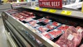 Fresh cuts of Prime Beef meat in the refridgerated meat aisle of a Sams Club grocery store ready to be purchased by consumers