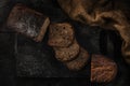 Cutted bread baked homemade artisan sourdough rye on table close-up. Fresh bread on the kitchen table. Traditional bakery