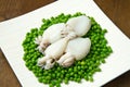 Fresh cuttlefish with peas Royalty Free Stock Photo
