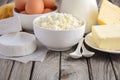 Fresh dairy products. Milk, cheese, brie, Camembert, butter, yogurt, cottage cheese and eggs on wooden table. Royalty Free Stock Photo