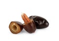 Fresh dates are whole and in a cut on a white background Royalty Free Stock Photo