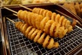 Fresh deep fried potatoes as japanese street food in Osaka Royalty Free Stock Photo
