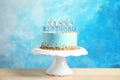Fresh delicious birthday cake with candles on stand Royalty Free Stock Photo