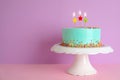 Fresh delicious birthday cake with candles on stand Royalty Free Stock Photo