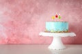 Fresh delicious birthday cake with candles on stand Royalty Free Stock Photo