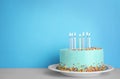 Fresh delicious birthday cake with candles on table Royalty Free Stock Photo