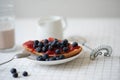 Fresh delicious breakfast with Coffee, crispy croissants, jam on white wooden background. Selective focus. Royalty Free Stock Photo