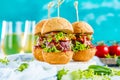 Fresh delicious burgers in Form of Football soccer, Royalty Free Stock Photo