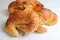 Fresh delicious butter croissant white background.