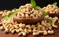 Fresh delicious cashew nuts in bowl on wooden table Royalty Free Stock Photo