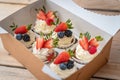 Fresh,delicious cupcakes with yogurt cream and fresh berries. Muffin with cream Royalty Free Stock Photo