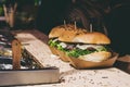 Fresh delicious grilled burgers on the table. Burger festival