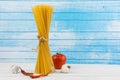 Fresh Delicious Italian Pasta Spaghetti Tide Together With Grunge Natural Flux Tie With Bio Organic Fresh Tomato Red Chilli Royalty Free Stock Photo