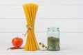 Fresh Delicious Italian Pasta Spaghetti Tide Together With Grunge Natural Flux Tie With Bio Organic Fresh Tomato Red Chilli Royalty Free Stock Photo