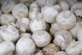 Fresh, delicious organic button mushrooms on a farmers market stall in the UK