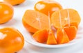 Fresh, delicious, ripe, organic Fuyu Persimmon Royalty Free Stock Photo