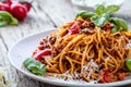 Fresh and delicious spagetti bolognese on wooden table. Royalty Free Stock Photo