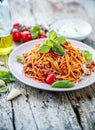 Fresh and delicious spagetti bolognese on wooden table. Royalty Free Stock Photo