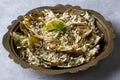 Fresh delicious stuffed artichoke, best Turkish food. Turkish name Zeytinyagli Enginar Dolmasi