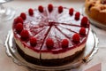 Fresh dessert fruit cake covered in raspberries ( Snowwhite cake