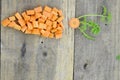 Fresh diced and sliced carrot on wooden rustic Royalty Free Stock Photo