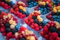 Fresh different berries in the plastic cup at Europe street berries and exotic fruits at market streetshop Royalty Free Stock Photo