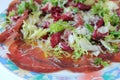 Fresh dish of bresaola, in salad Royalty Free Stock Photo