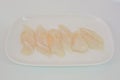 Fresh Dolly fish slice on white dish isolate on white background