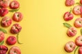 Fresh donut peaches on yellow background, flat lay. Space for text