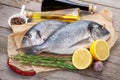 Fresh dorado fish cooking with spices and condiments Royalty Free Stock Photo