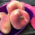 Fresh doughnut peaches fruits in closeup
