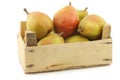 Fresh doyennÃÂ© de comice pears in a wooden crate Royalty Free Stock Photo