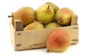 Fresh doyennÃÂ© de comice pears in a wooden crate Royalty Free Stock Photo